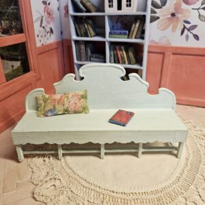 Ornate shabby chic miniature bench "Janice", with a pillow, and an antique miniature book, 12th scale