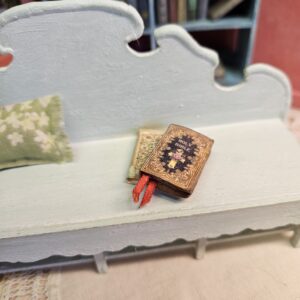 Miniature antique holy bible book 12th scale on "Janice" bench